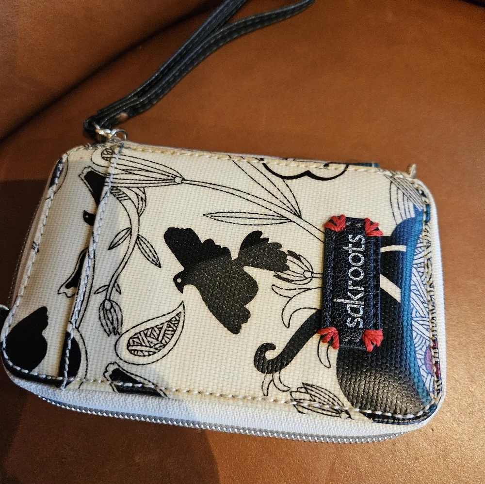 EUC sakroots zip around phone case/wristlet clutch